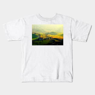 View from top on a hilly landscape with forests in the background Kids T-Shirt